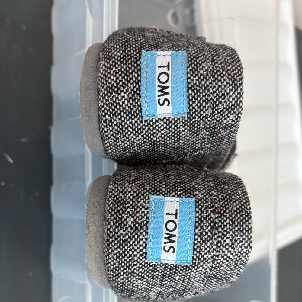 TOMS Speckled Black and Gray Slip-Ons